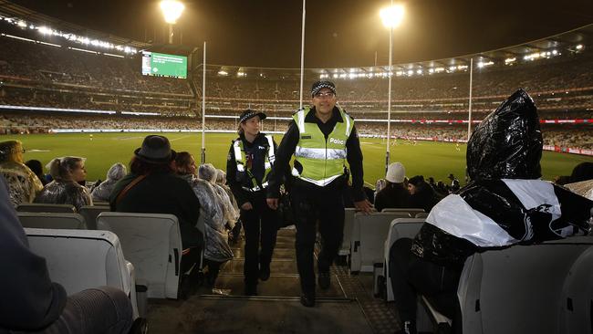 Police patrol all areas at the MCG. Picture: David Caird