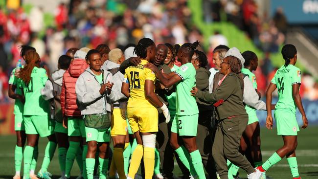 Nigeria’s Goalkeeper Chiamaka Nnadozie (centre) is congratulated by her teammates after the 0-0 FIFA Women's World Cup draw with Canada. Picture: Robert Cianflone/Getty Images