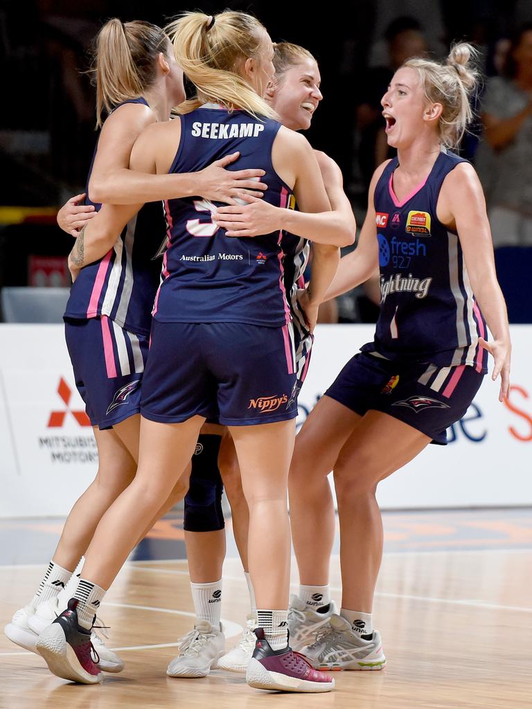 Adelaide Lightning players celebrate beating Melbourne Boomers — and making it into the grand final series — last week. Picture: Naomi Jellicoe