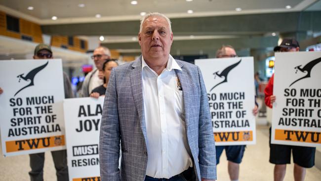 TWU NSW/QLD Secretary Richard Olsen at the Qantas terminal protesting job cuts. Picture: NCA NewsWire / Christian Gilles