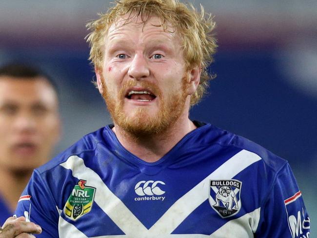 Bulldog James Graham and team during the Round 13 NRL game between the Canterbury Bulldogs vs the Cronulla Sharks at ANZ Stadium, Homebush .Picture Gregg Porteous