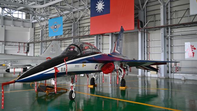 A locally-built TA-5 Brave Eagle advanced jet trainer operated by the Taiwanese air force is seen on display at an air force base hangar in Taitung, eastern Taiwan.