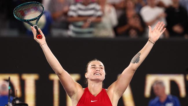 Belarus' Aryna Sabalenka celebrates after victory against China's Zheng Qinwen during their women's singles final match on day 14 of the Australian Open tennis tournament in Melbourne on January 27, 2024. (Photo by David GRAY / AFP) / -- IMAGE RESTRICTED TO EDITORIAL USE - STRICTLY NO COMMERCIAL USE --