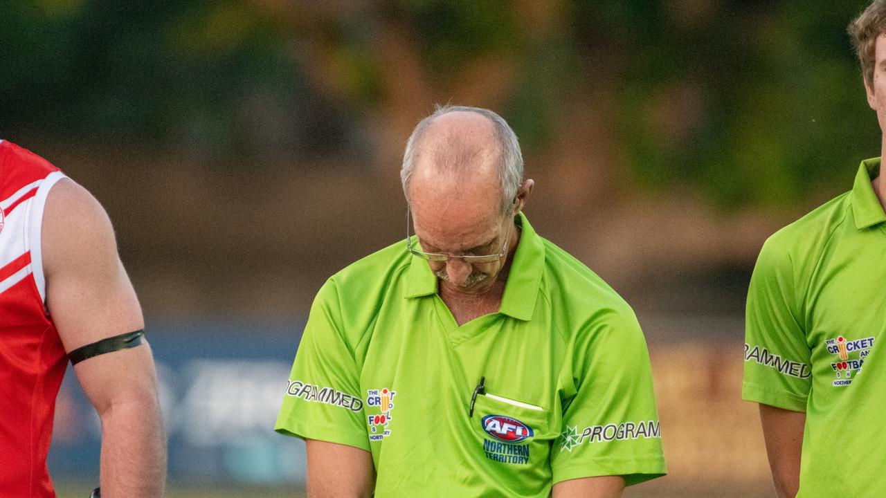 The Waratahs pay tribute to late, great ruckman Alexander ‘Rooch’ Aurrichio at the first game under lights at Gardens Oval. Picture: Aaron Black/AFLNT Media