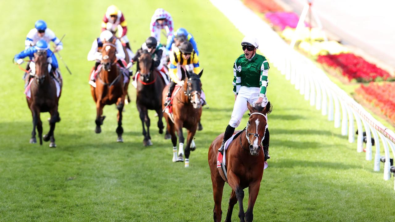 MELBOURNE, AUSTRALIA - OCTOBER 26: James McDonald riding Via Sistina (IRE) celebrates winning the Ladbrokes Cox Plate and his 100th Group 1 race during Cox Plate Day at Moonee Valley Racecourse on October 26, 2024 in Melbourne, Australia. (Photo by Kelly Defina/Getty Images)