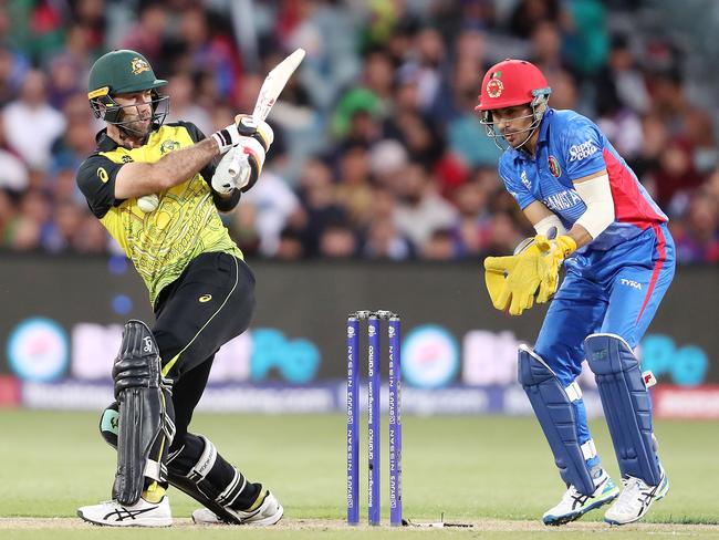 ADELAIDE, AUSTRALIA - NOVEMBER 04:  Glenn Maxwell of Australia and Rahmanullah Gurbaz of Afghanistan during the ICC Men's T20 World Cup match between Australia and Afghanistan at Adelaide Oval on November 04, 2022 in Adelaide, Australia. (Photo by Sarah Reed/Getty Images)