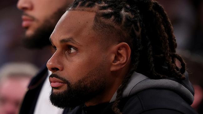 NEW YORK, NEW YORK – MARCH 01: Patty Mills #8 and Ben Simmons #10 of the Brooklyn Nets look on from the bench in the second half against the New York Knicks at Madison Square Garden on March 01, 2023 in New York City. The New York Knicks defeated the Brooklyn Nets 149-118. NOTE TO USER: User expressly acknowledges and agrees that, by downloading and or using this photograph, User is consenting to the terms and conditions of the Getty Images License Agreement. (Photo by Elsa/Getty Images)