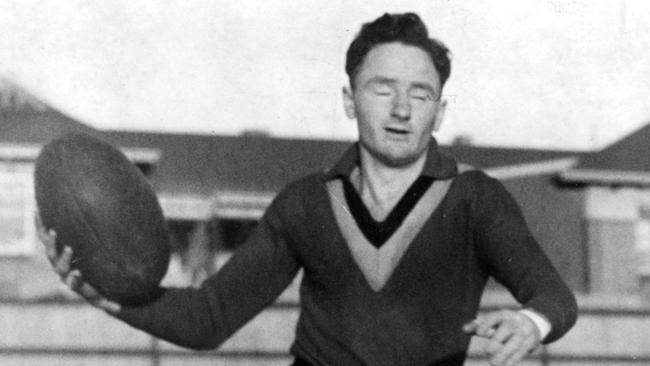 SA footballer Sam Gallagher playing state football in 1950s. a/ct