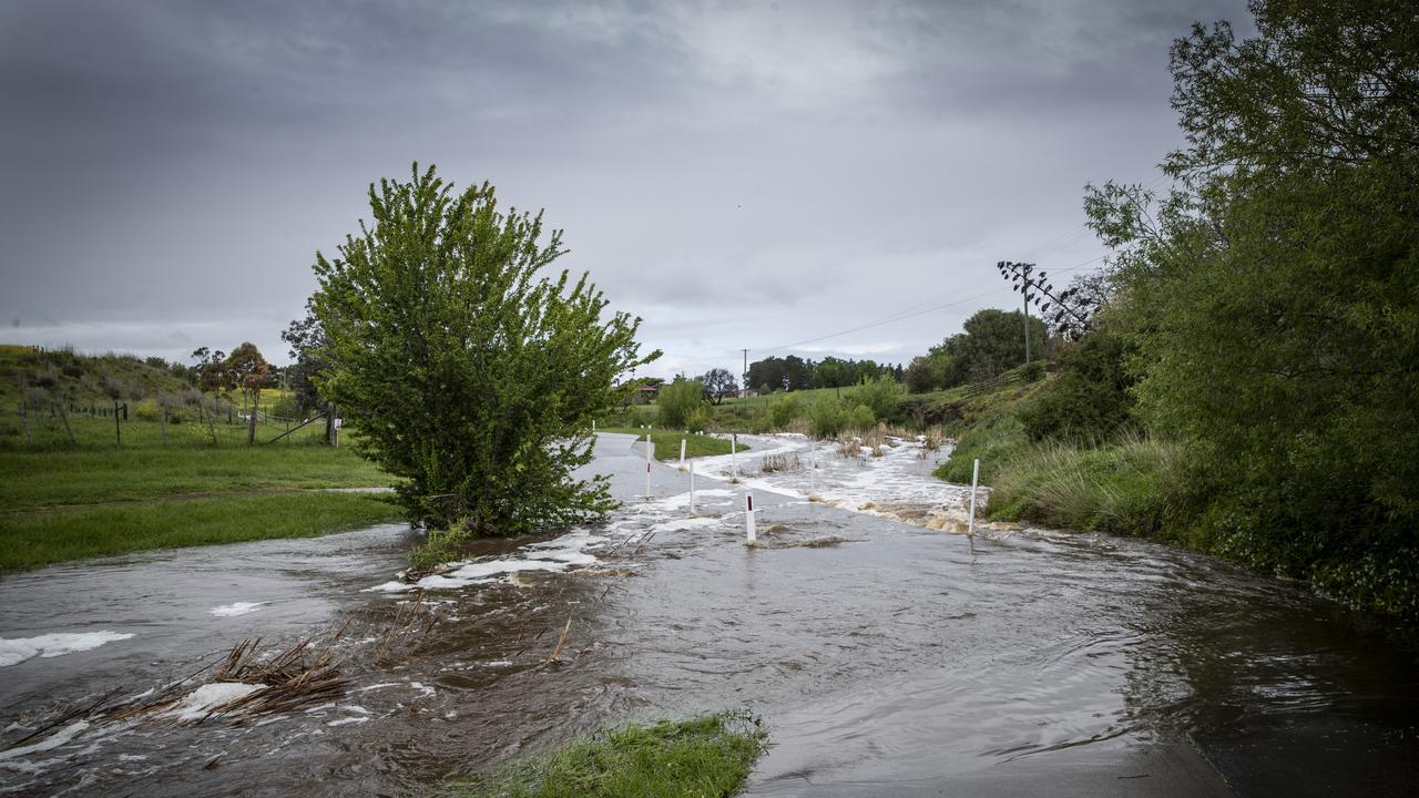 Sorell Rivulet near Pioneer Park overflowing due to the high amount of rainfall. Picture: LUKE BOWDEN