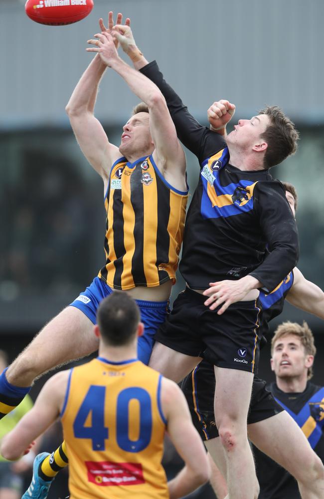 Chad Jones rises for a mark during St Bernard’s crushing grand final win over Old Carey. Picture: David Crosling