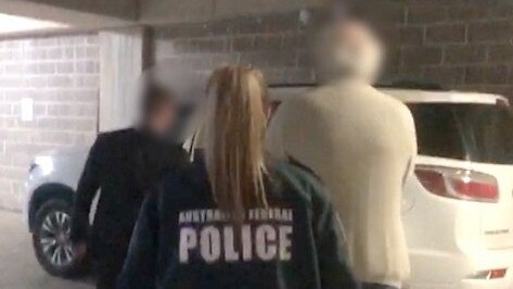 AFP officers arrest Robert Alan Hill, 68, at his Lakemba home over allegations he shared images of child torture and child sexual abuse online. Picture: AFP