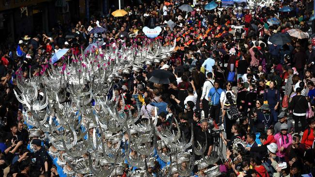 Members of the Miao ethnic minority celebrate their new year in Guizhou, where nine counties on Monday were declared poverty free. Picture: AFP