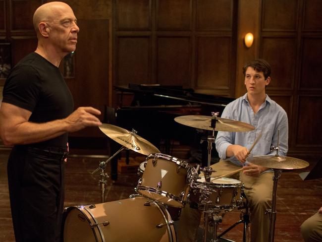 J.K. Simmons and Miles Teller in WHIPLASH.