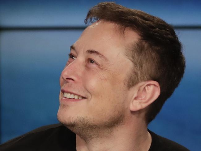 FILE- In this Feb. 6, 2018, file photo, Elon Musk, founder, CEO, and lead designer of SpaceX, speaks at a news conference after the Falcon 9 SpaceX heavy rocket launched successfully from the Kennedy Space Center in Cape Canaveral, Fla. South Africa-born Elon Musk created electric car maker Tesla. A study last year by the Center for American Entrepreneurship concluded that 43 percent of the companies in the Fortune 500 were founded by first- or second-generation immigrants. (AP Photo/John Raoux, File)