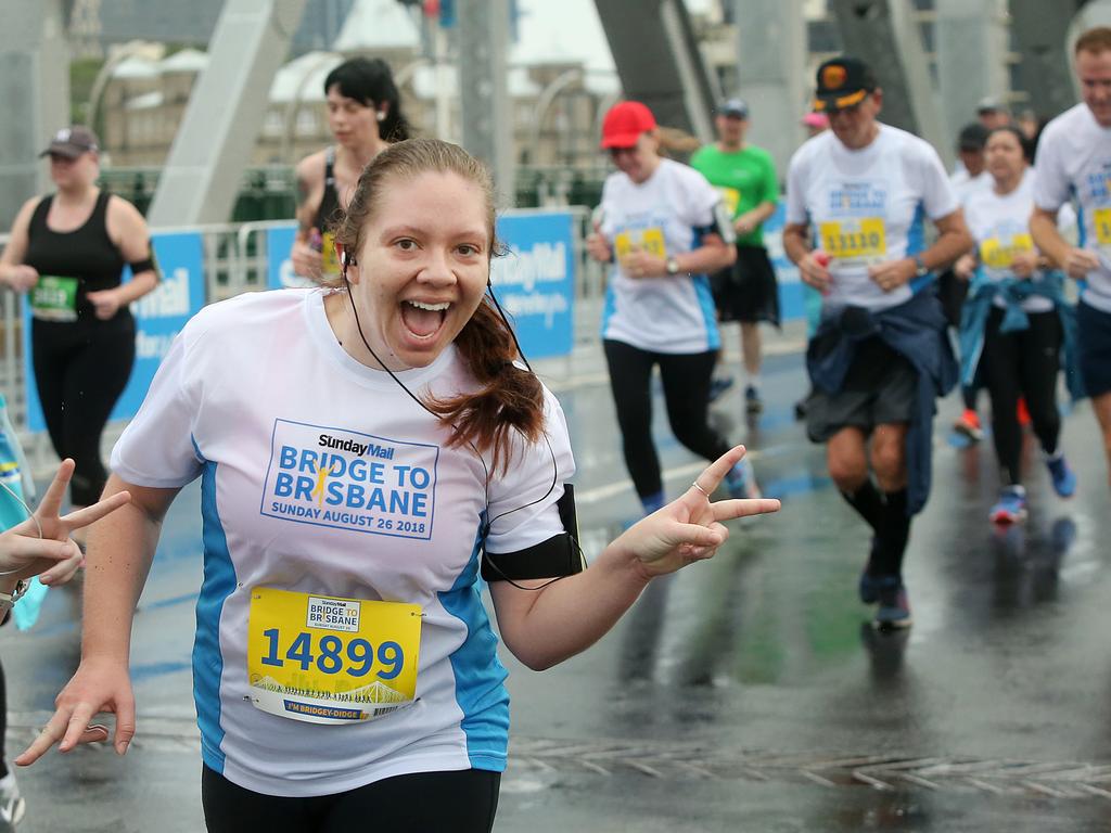 <p>Phoebe Webber in the 10km run at the Sunday Mail Bridge to Brisbane fun Run, Sunday August 26, 2018. (AAP Image/Jono Searle)</p>