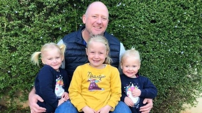 Dr Graham Dickason with daughters, Liane, centre, and twins Maya and Karla.