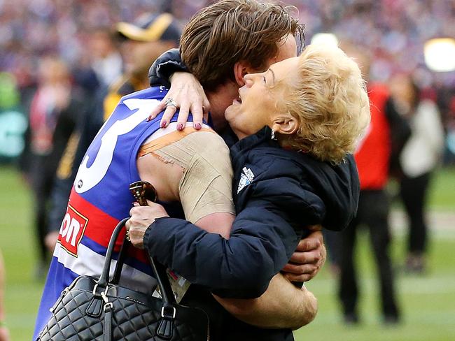 Jordan Roughead embraces Susan Alberti after the siren at the 2016 AFL Grand Final. Picture: Mark Stewart