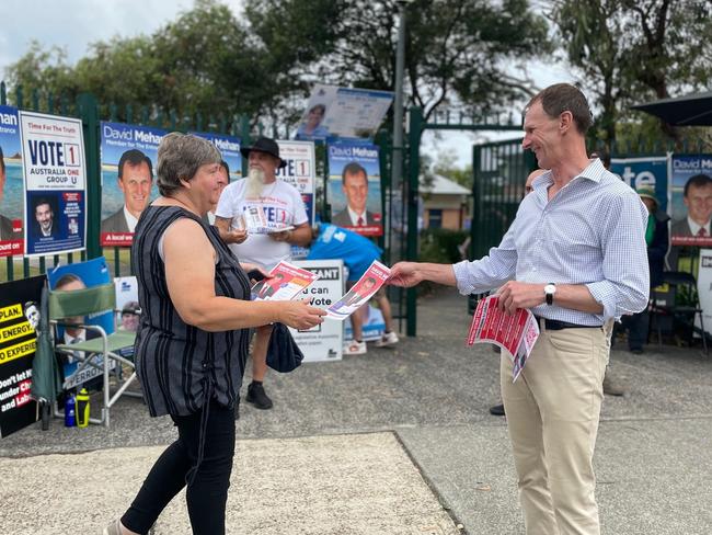 The Entrance State Labor MP David Mehan hands out how to vote flyers at Brooke Ave Public School during the 2023 NSW State Election. Picture: NewsLocal