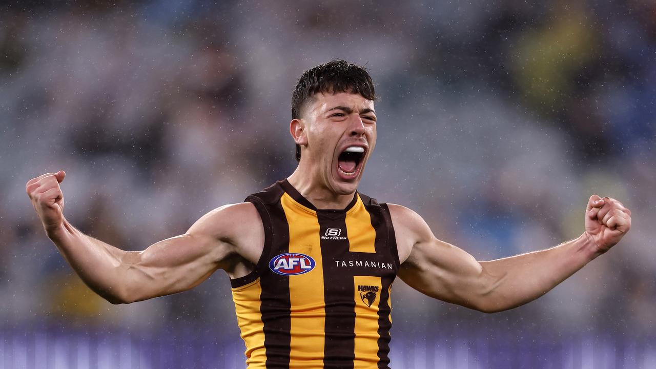 MELBOURNE, AUSTRALIA - JULY 20: Massimo D'Ambrosio of the Hawks celebrates a goal during the round 19 AFL match between Hawthorn Hawks and Collingwood Magpies at Melbourne Cricket Ground, on July 20, 2024, in Melbourne, Australia. (Photo by Darrian Traynor/Getty Images)