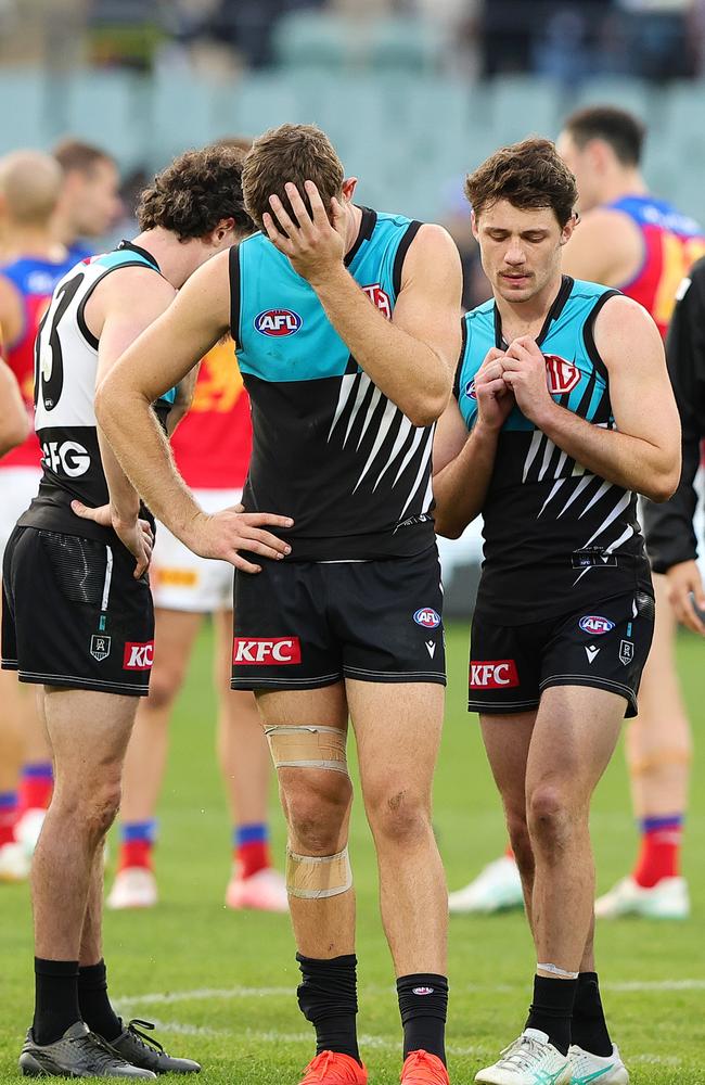 Mitch Georgiades and Jed McEntee react after the loss to Brisbane. Picture: Sarah Reed/AFL Photos via Getty Images.