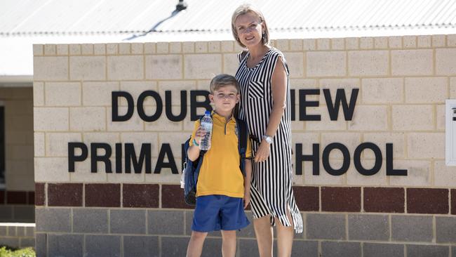 Elmarie Dupreez with her son Miller, 7, yesterday. Picture: Matthew Poon