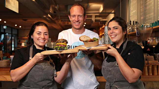 Vanessa Medeiros, Phil Dawson and Head Chef Carolina Cazelli posing for a photo at Ruby Lance Cafe. AAP IMAGE/ Adam Yip