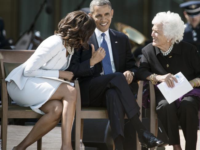 Barbara Bush speaks with Michelle Obama and Barack Obama during a dedication ceremony at the George W. Bush Library and Museum at Southern Methodist University in Dallas in 2013. Picture: AFP
