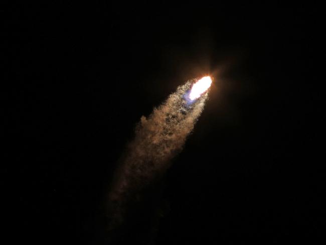 TOPSHOT - A SpaceX Falcon 9 rocket soars into orbit from the Kennedy Space Center on the Intuitive Machines' Nova-C moon lander mission, in Cape Canaveral, Florida, on February 15, 2024. The IM-1 mission is part of NASAâs Commercial Lunar Payload Services (CLPS) program to understand more about the Moonâs surface ahead of the coming Artemis missions. Intuitive Machines' Odysseus lander would be the first US spacecraft to land on the moon in over 50 years. It is expected to land near the south pole of the moon on February 22. (Photo by Gregg Newton / AFP)