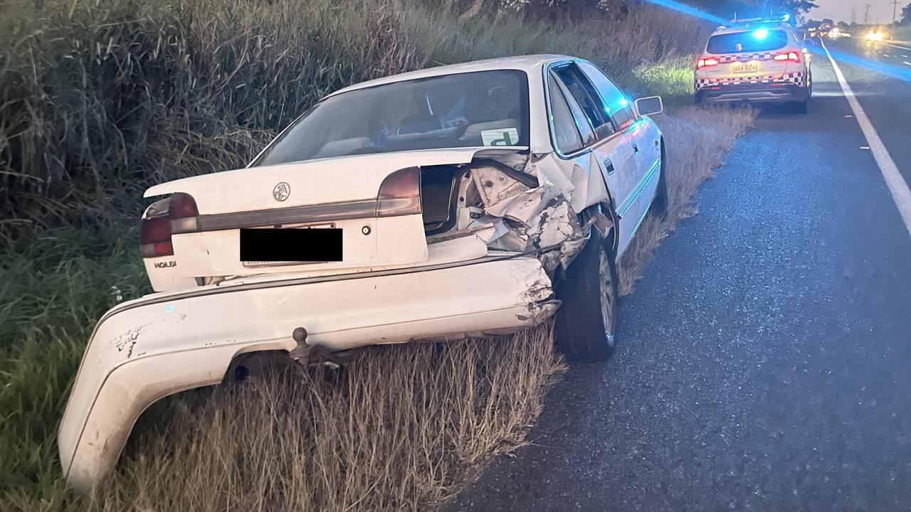 A white sedan struck by a speeding driver at the crash. Photo: Heidi Petith