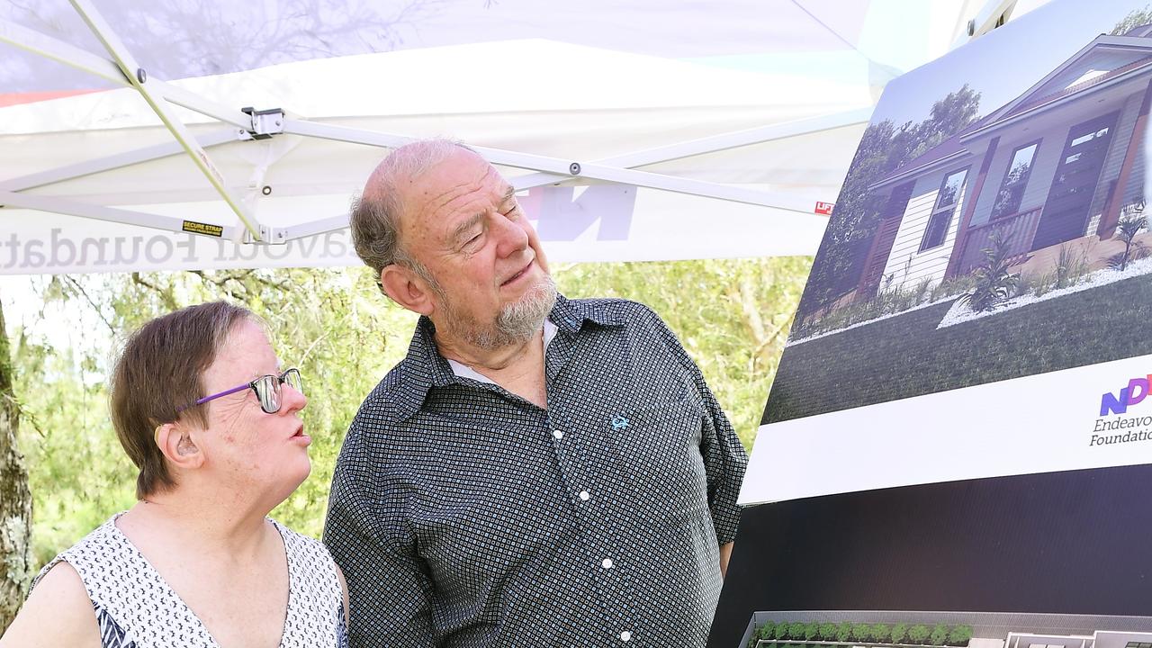 Tessa Bates and her brother Garry Bates, an Endeavour Foundation area committee member inspect the new support housing designs in Tewantion. Picture: Patrick Woods.