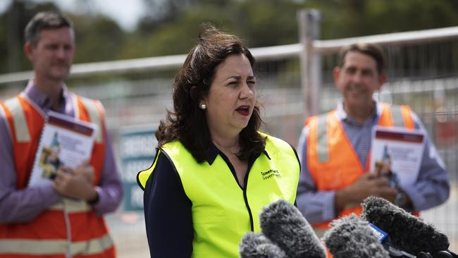 Premier Annastacia Palaszczuk with Ministers Mark Bailey and Cameron Dick. Picture: Attila Csaszar.