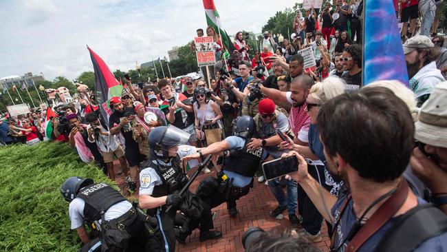 Pro-Palestinian protesters and police clash at Union Station. Picture: Matthew Hatcher/AFP