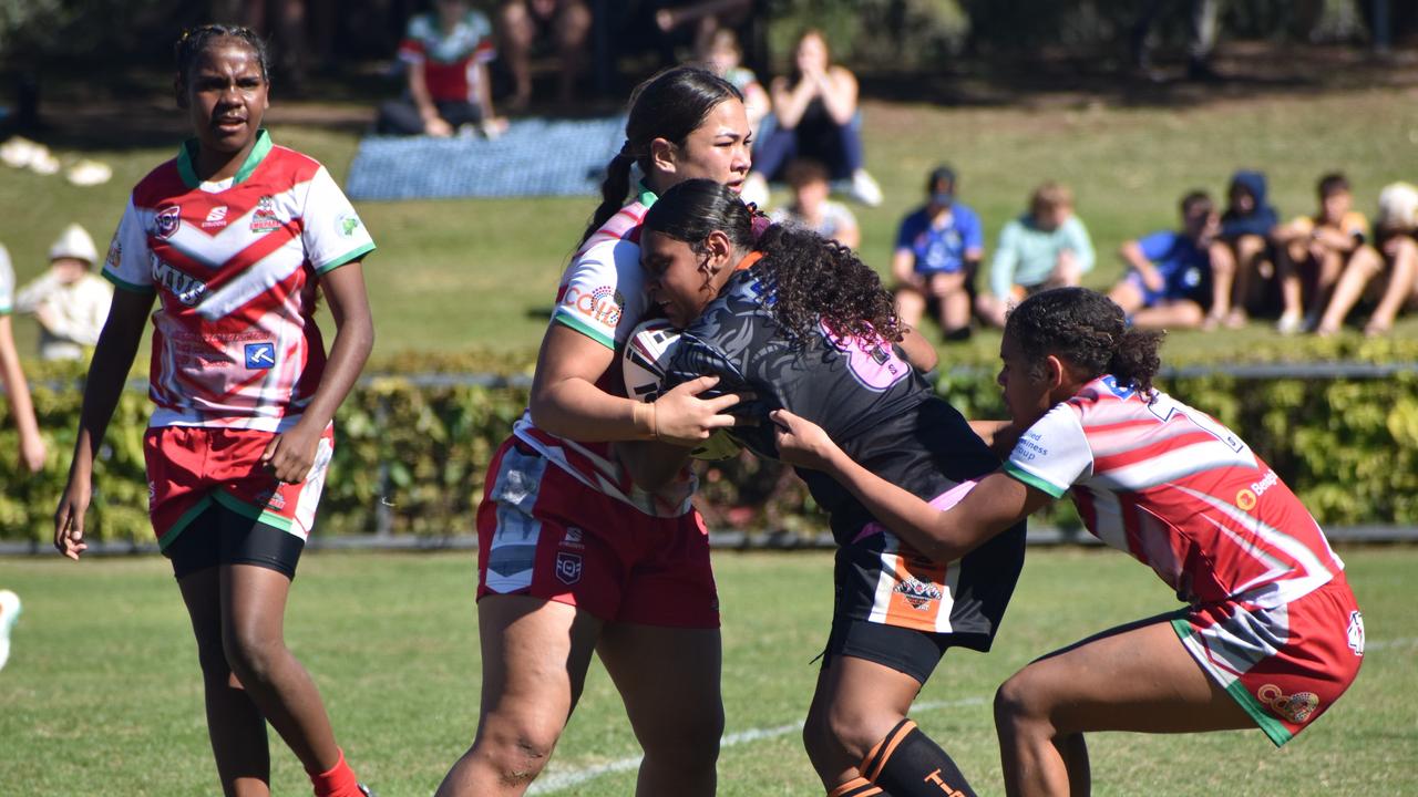 Rockhampton Tigers' prop Kiara Walker makes a barnstorming run in the Rocky Junior League under-14 girls grand final at Rugby Park on June 8, 2024.