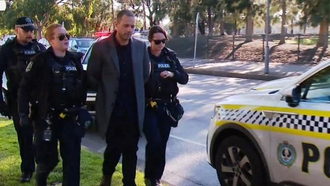 Joe Chehade is arrested in North Adelaide on Sunday. Picture: 9News