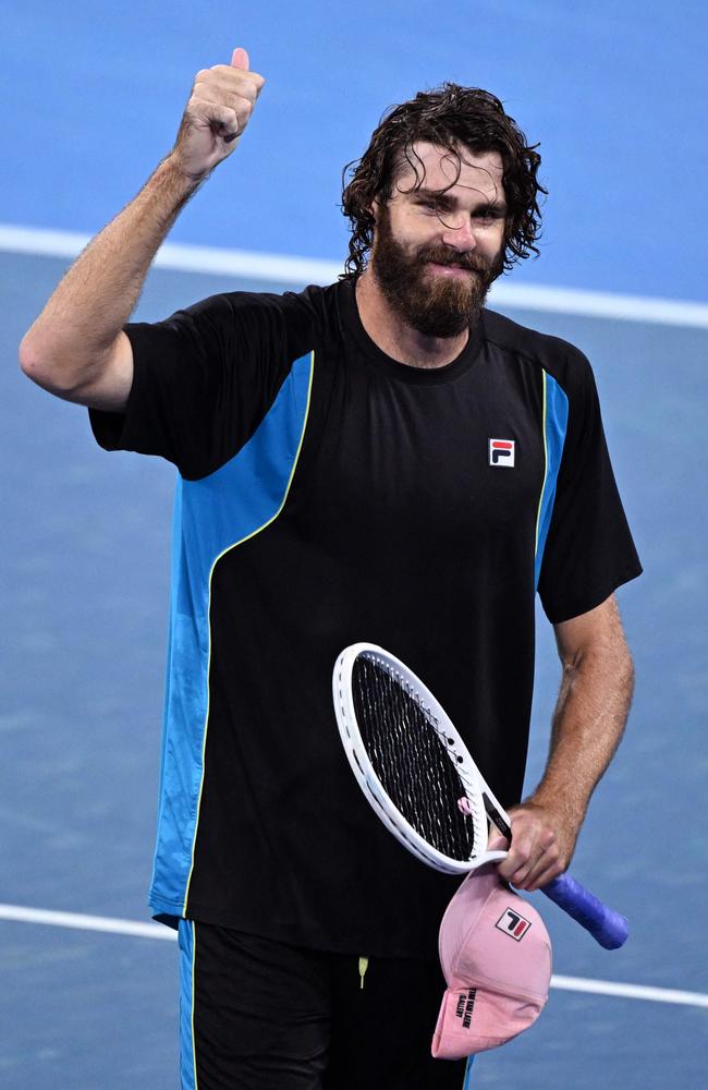 Reilly Opelka celebrates defeating Novak Djokovic at the Brisbane International. Picture: AFP