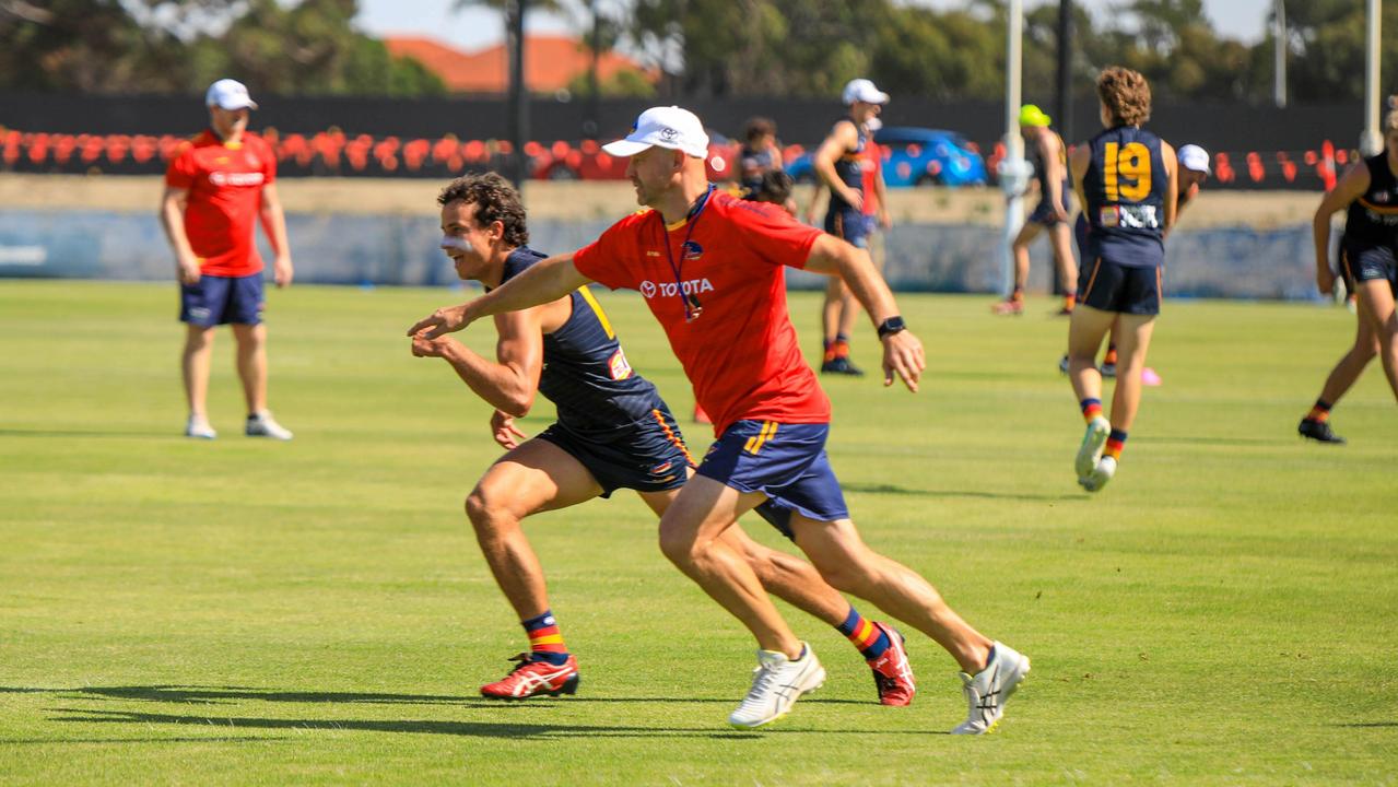 Adelaide Football Club player Will Hamill and Coach Matthew Nicks back at training. Picture: James Hetherington/AFC Media