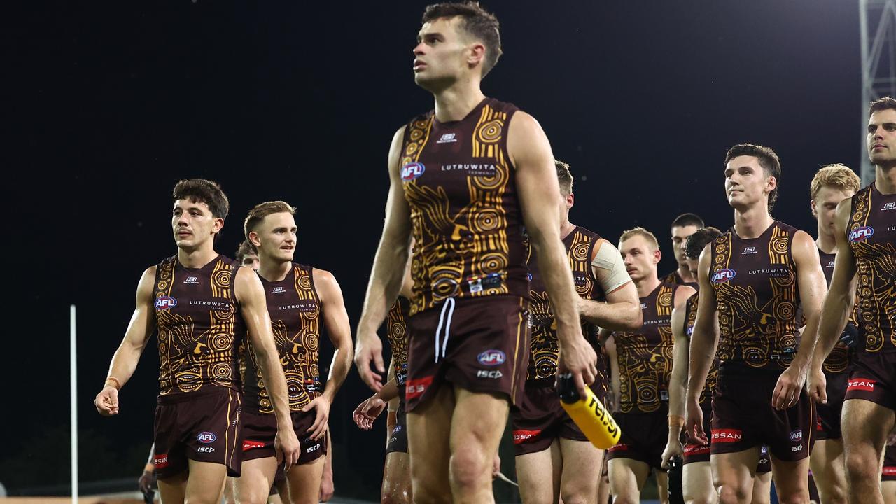Dejected Hawthorn players after their eight-point loss to the Suns. Picture: James Wiltshire/AFL Photos via Getty Images