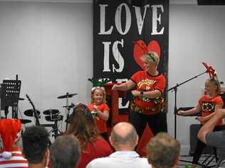 FEELING GROOVY: Senior Pastor Heidi Westbrook dances with her daughters Emmalee and Sophia. Picture: James Liveris