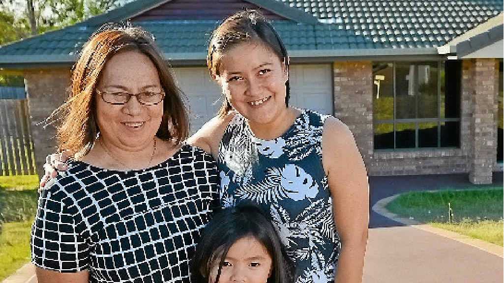 Ryan Sirait’s mum Yetty and his daughter and wife Aileen and Marleen Sirait are very excited about their new house. Picture: Mike Richards