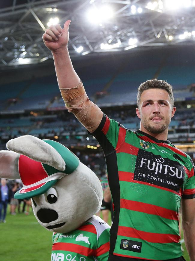 Sam Burgess celebrates victory with the crowd after Souths defeated St George in the NRL semi-final. Picture: Brett Costello