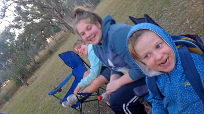 HOLIDAY TREAT: Ben, Amy and Isaac living it up in the cold outdoors. Picture: Andrew Gale