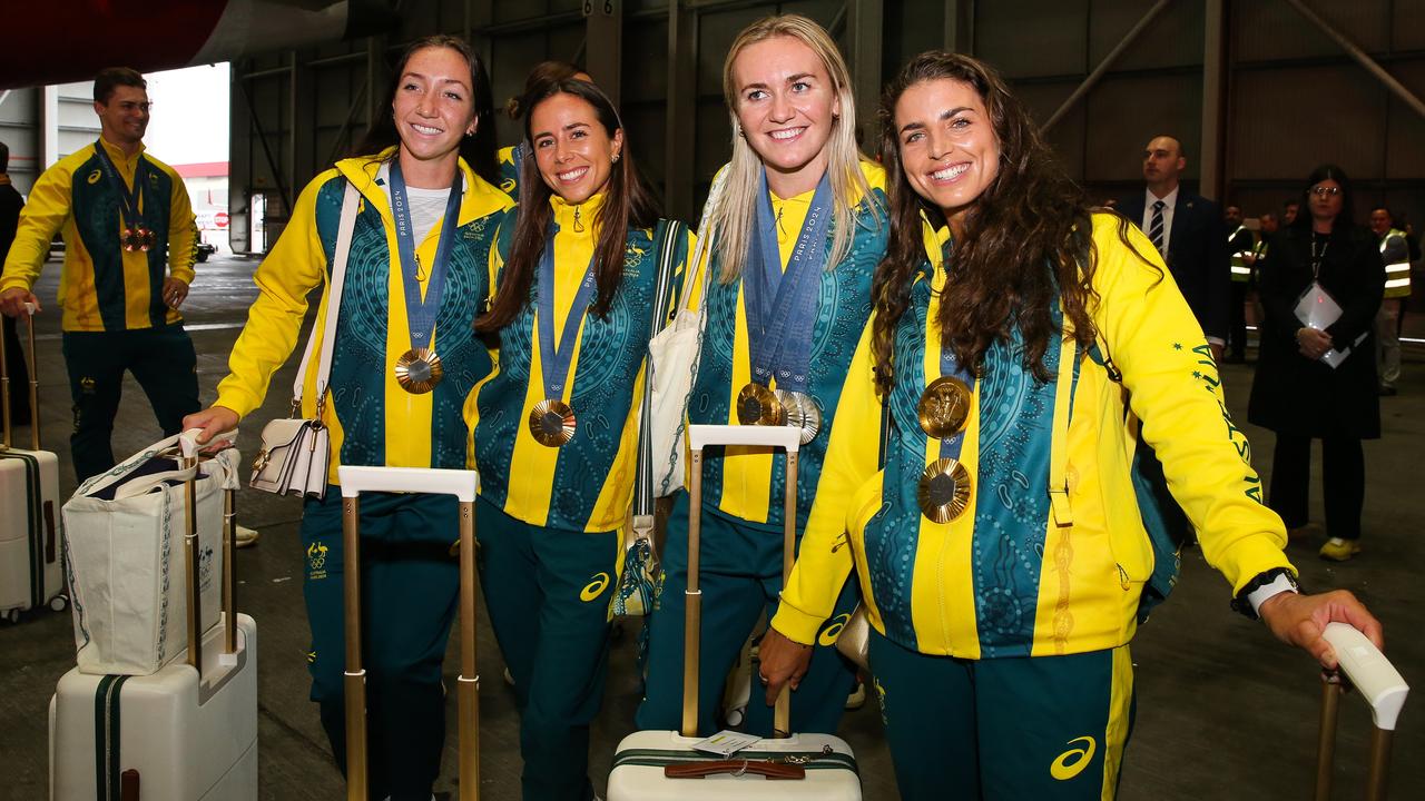 Athletes Lani Pallister, Noemi Fox, Ariarne Titmus, and Jessica Fox arriving back in Australia.