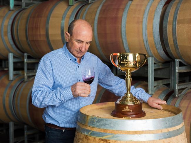 Joe Agresta, former trackwork rider for Bart Cummings, enjoys a glass of red at the Wolf Blass winery in the Barossa Valley.