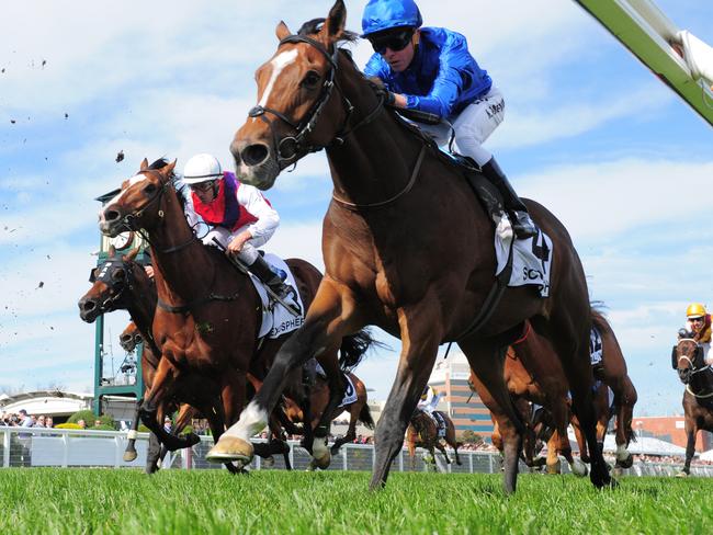 Kerrin McEvoy and Scottish edge out Damien Oliver and Exospheric (white cap) as they fill the minor placings in the Caulfield Cup. Picture: Getty Images