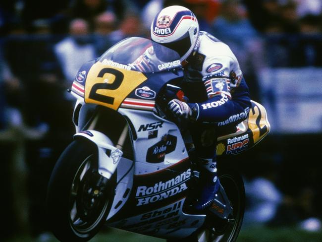 PHILLIP ISLAND, AUSTRALIA - 1989:  Wayne Gardner of Australia for the Rothmans Honda Team wheelies his bike during the 1989 Australian Motorcycle Grand Prix at Phillip Island in Australia. (photo by Getty Images)