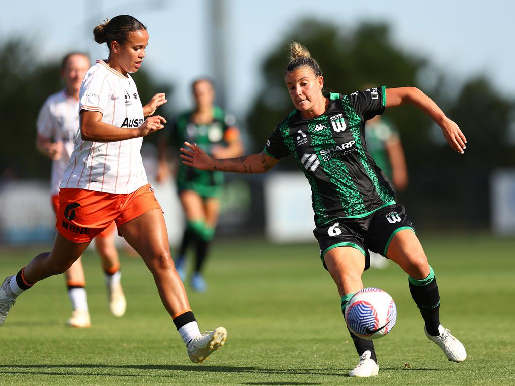 Chloe Logarzo (right) drives Western United forward. Picture: Graham Denholm/Getty Images