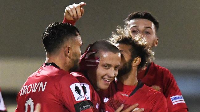 Hume City’s Marko Delic celebrates scoring the first of his three goals against Adelaide Olympic. Picture: Getty Images