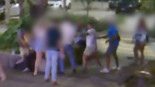 Shock moment dad throws punches outside hotel