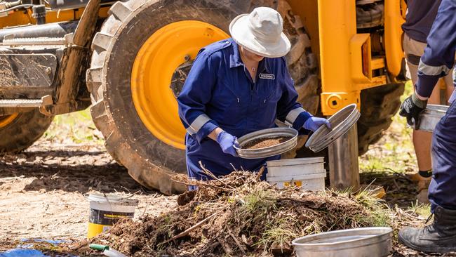 Investigators at the site west of Dargo where the remains of Carol Clay and Russell Hill were recovered. Picture: Jason Edwards