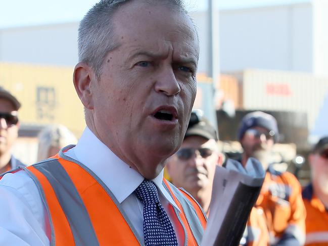 19/03/2019The Leader of the Opposition, Bill Shorten and  LaborÕs candidate for Swan, Hannah Beazley with workers at Komatsu Australia.pic Colin Murty The Australian